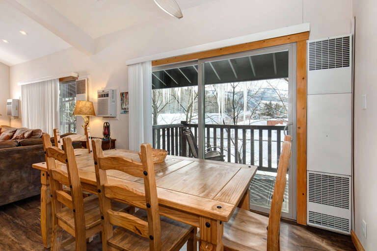 Inviting setup next to serene outdoor patio for delightful meals