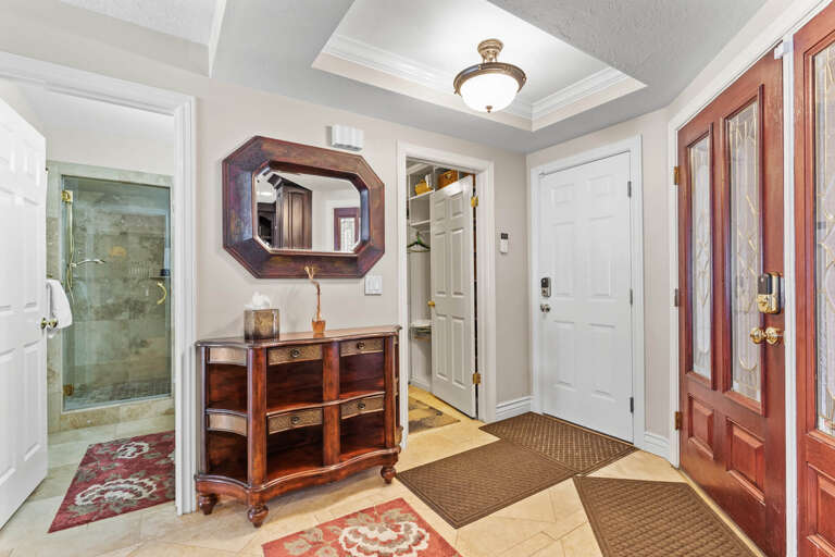 Bathroom: "Conveniently located near the receiving area for easy access."