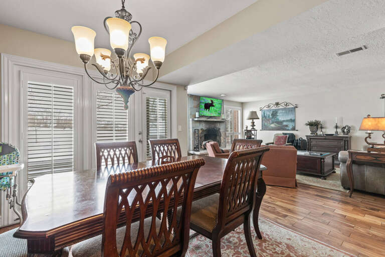 Cozy dining table next to the living room area.