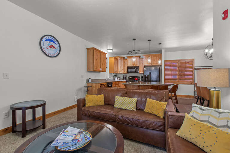 Vacation Rentals in Park City at Bear Hollow Lodges 4205 Living room with gas fireplace and patio access