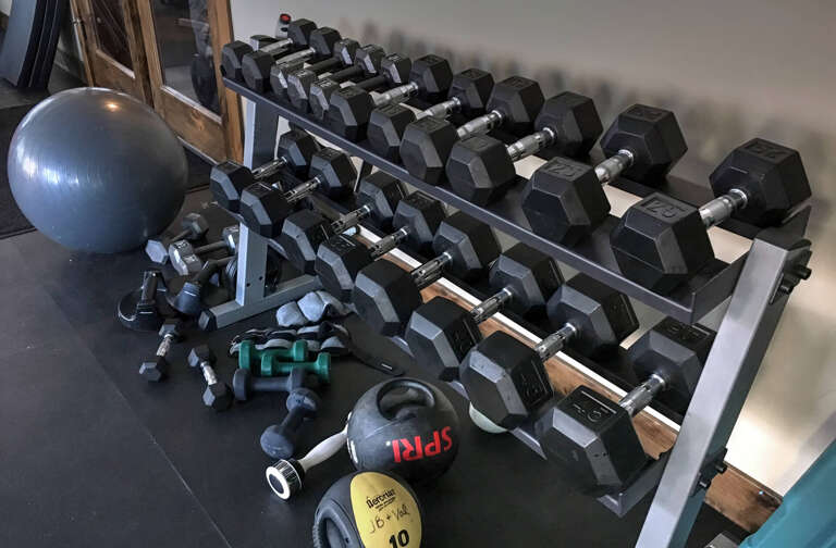 Your private fitness area with free weights, kettlebells, and stability balls—everything you need for energizing workouts during your stay.