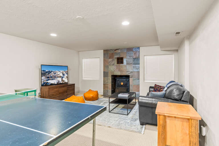 Vacation Rentals in Park City at Park West Village 3953: Lower level family room with ping-pong table Vacation Rentals in Park City at Park West Village 3953: Lower level family room with ping-pong table