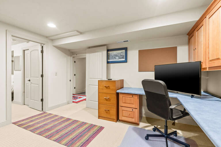 This quiet workspace offers your own desk, comfortable chair, and storage cabinets—perfect for catching up on work or planning your next adventure.