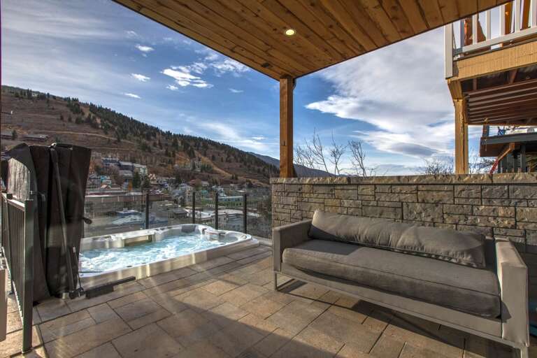 Serene mountain view from your own private hot tub retreat.