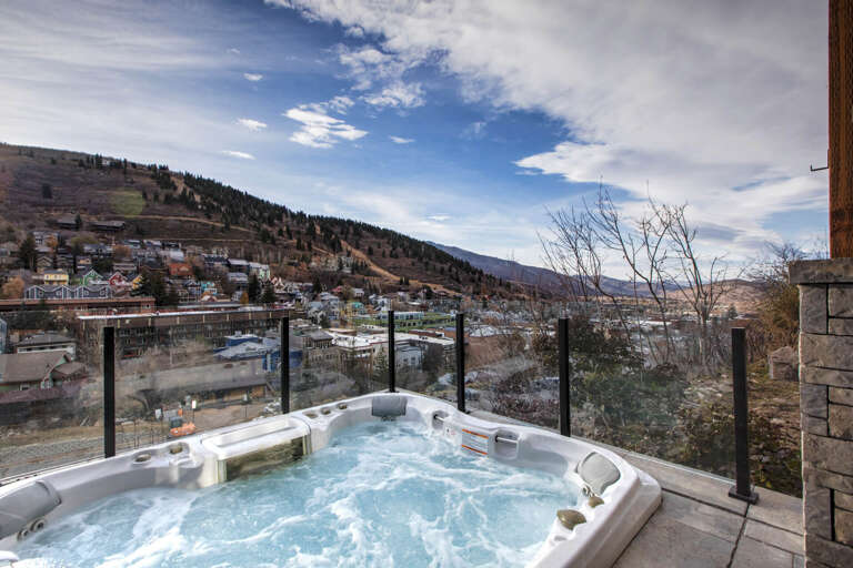 Serene mountain view from your own private hot tub retreat.