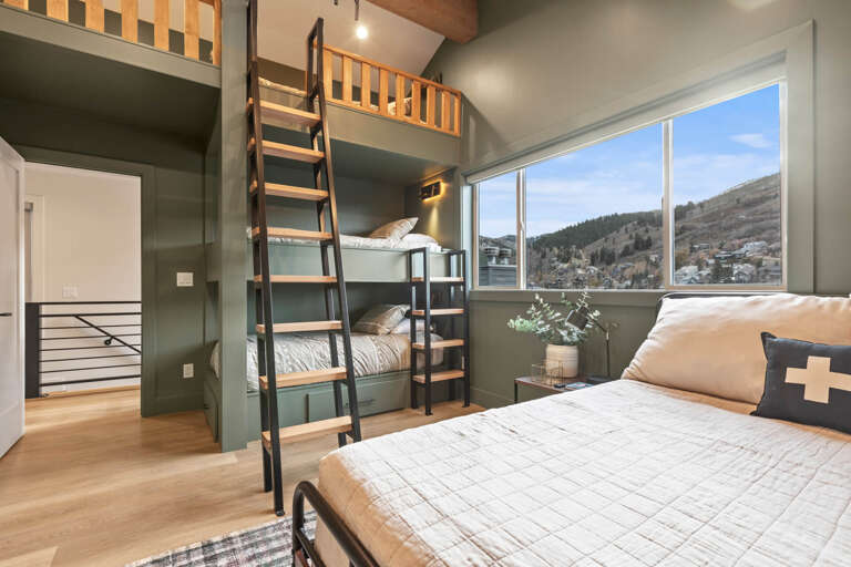 Upper Main 237: Guest Queen bedroom with triple Twin bunkbeds