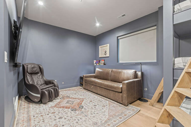Upper Main 237: Triple bunkbeds and sofa bedroom - cozy seating area with a massage chair and entertainment center