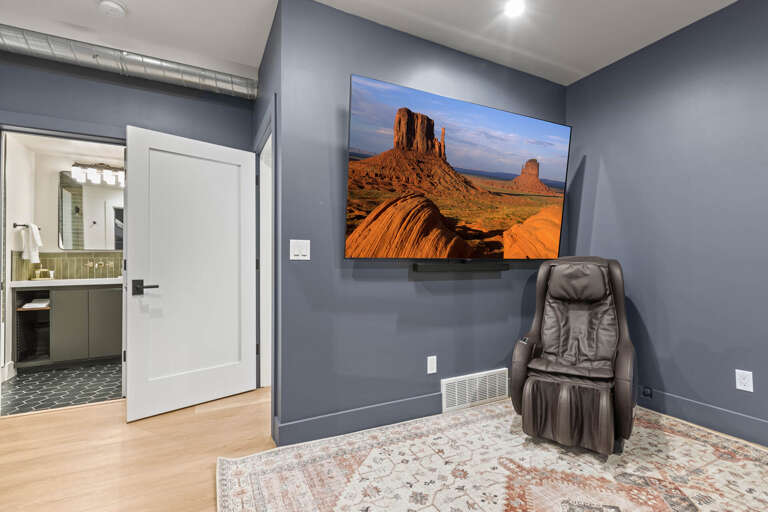 Upper Main 237: Triple bunkbeds and sofa bedroom - cozy seating area with a massage chair and entertainment center