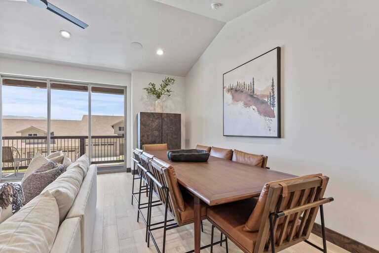 Black Rock Ridge 14488: "Cozy space with dining table, sofa set, and access to outdoor patio."