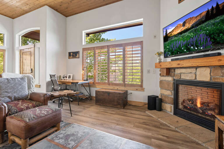 Bear Hollow Village 5595: Cozy space with a sofa set, fireplace, desk, and chair. Bear Hollow Village 5595: Cozy space with a sofa set, fireplace, desk, and chair.