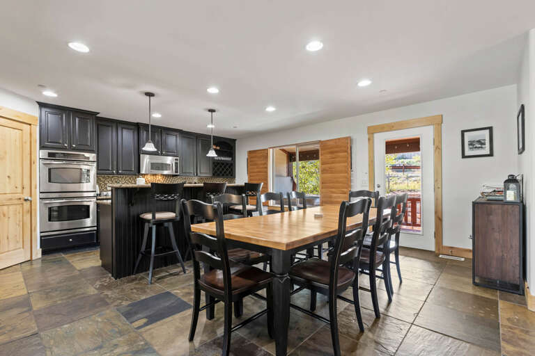 Bear Hollow Village 5595: Dining Area: "Chic dining table with sleek bar stools on a glossy table top." Bear Hollow Village 5595: Dining Area: "Chic dining table with sleek bar stools on a glossy table top."