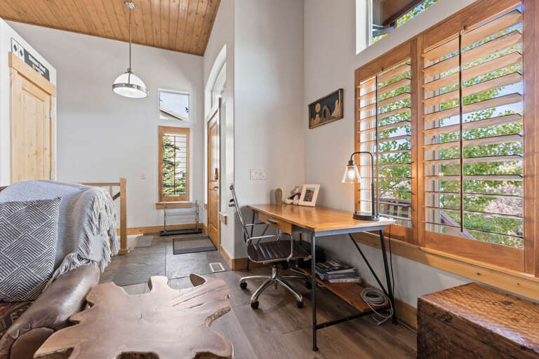 Bear Hollow Village 5595: Minimalist desk and chair setup in a cozy corner. Bear Hollow Village 5595: Minimalist desk and chair setup in a cozy corner.