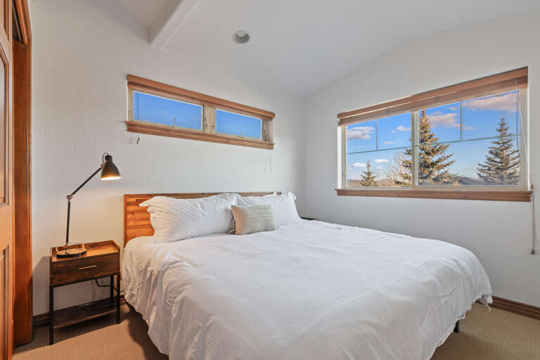 Bear Hollow 5482: Cozy bed by the window, perfect for a relaxing retreat