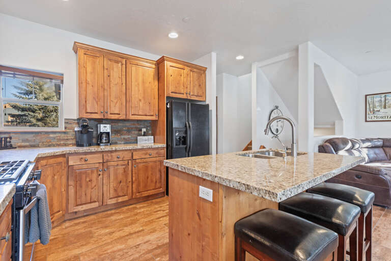 Bear Hollow 5482: Modern appliances and ample storage in sleek kitchen design.