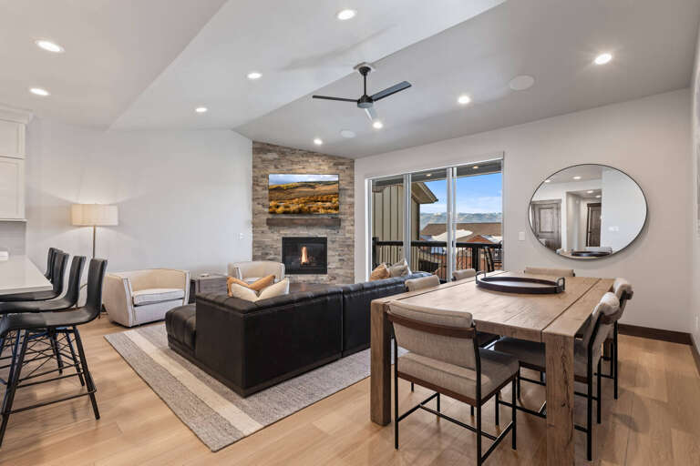 Black Rock Ridge 14536: Cozy space with fireplace, dining table outdoor access, perfect for relaxation. Black Rock Ridge 14536: Cozy space with fireplace, dining table outdoor access, perfect for relaxation.