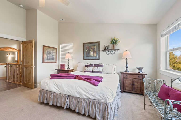 Bear Hollow Village 5426: The first of four bedrooms is the spacious, serene PRIMARY SUITE, complete with a king-size bed, sofa, HDTV, and a spa-inspired ENSUITE BATHROOM with two vanity sinks, a soaking tub, and a separate step-in shower. Bear Hollow Village 5426: The first of four bedrooms is the spacious, serene PRIMARY SUITE, complete with a king-size bed, sofa, HDTV, and a spa-inspired ENSUITE BATHROOM with two vanity sinks, a soaking tub, and a separate step-in shower.