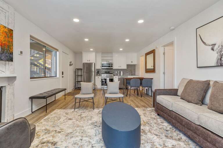 Cozy space with a glimpse of the kitchen and dining area. Cozy space with a glimpse of the kitchen and dining area.
