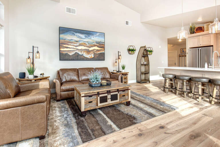 Mayflower Lakeside 303-14: Cozy sofa set by the windows, perfect spot for relaxation. Mayflower Lakeside 303-14: Cozy sofa set by the windows, perfect spot for relaxation.