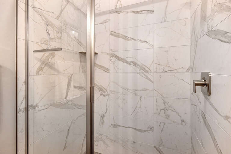 Mayflower Lakeside 303-14: Modern shower with sleek glass enclosure, a perfect oasis for relaxation. Mayflower Lakeside 303-14: Modern shower with sleek glass enclosure, a perfect oasis for relaxation.