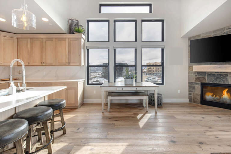 Mayflower Lakeside 303-14: Sunlit space with a view, cozy bar stools for gatherings. Mayflower Lakeside 303-14: Sunlit space with a view, cozy bar stools for gatherings.