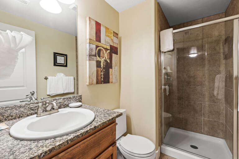 Freshen up in your private bathroom with granite counters, walk-in shower, and fluffy towels waiting for you after a relaxing soak.