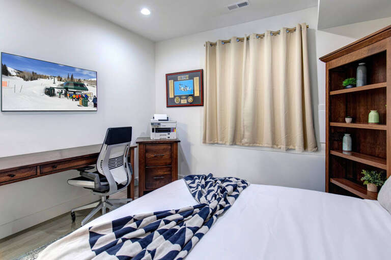 Wasatch Springs 1107: Full bedroom with attached half bathroom and desk