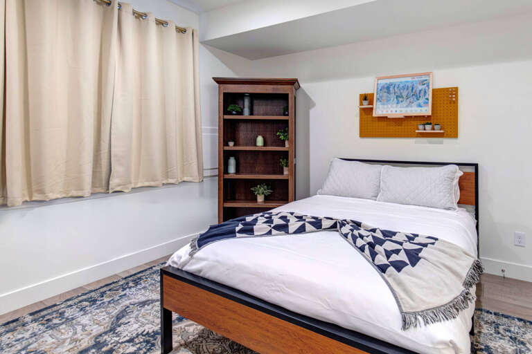 Wasatch Springs 1107: Full bedroom with attached half bathroom and desk