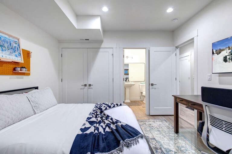 Wasatch Springs 1107: Full bedroom with attached half bathroom and desk