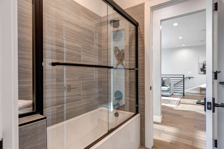 Comfort: Long tub perfect for post-adventure soaks.