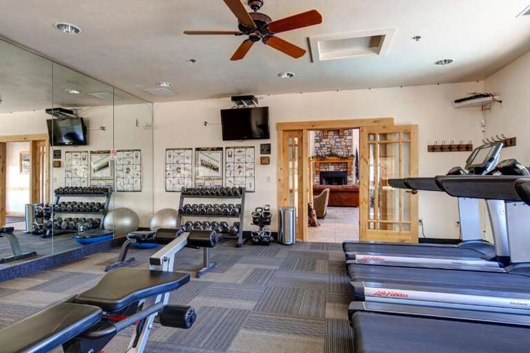 Stay fit during your getaway in this fully-equipped fitness center, featuring cardio machines, free weights, and a mirrored wall to perfect your form.