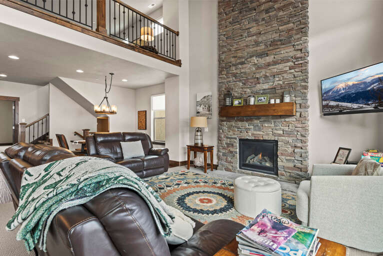 Retreat 13548: Main living area with comfortable seating and cozy gas fireplace.