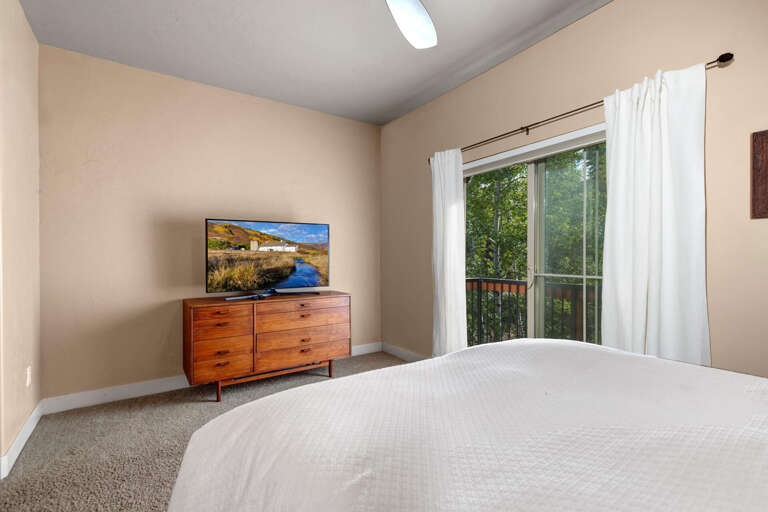 Bear Hollow Lodge 3301: Primary Queen bedroom with TV and Juliet balcony
