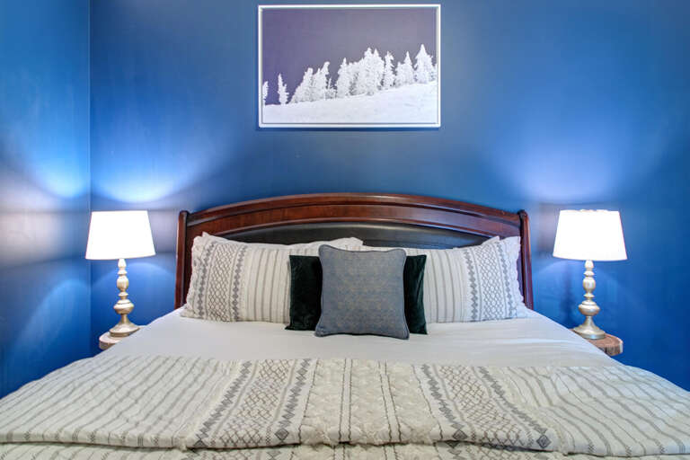 Crestview Commons A207: Comfortable king-sized bed in primary bedroom.