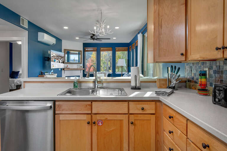 Crestview Commons A207: Fully equipped kitchen with dishwasher and sink.