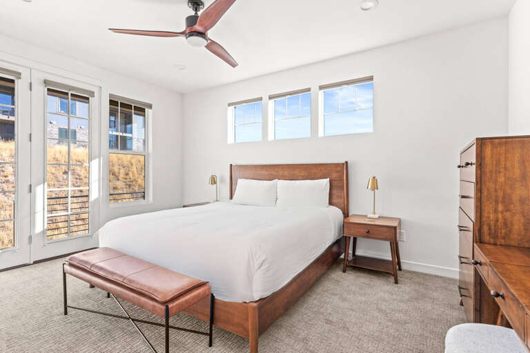 Jordanelle Ridge 499: The master suite upstairs offers a king bed, a private patio, and a luxurious ensuite bathroom.