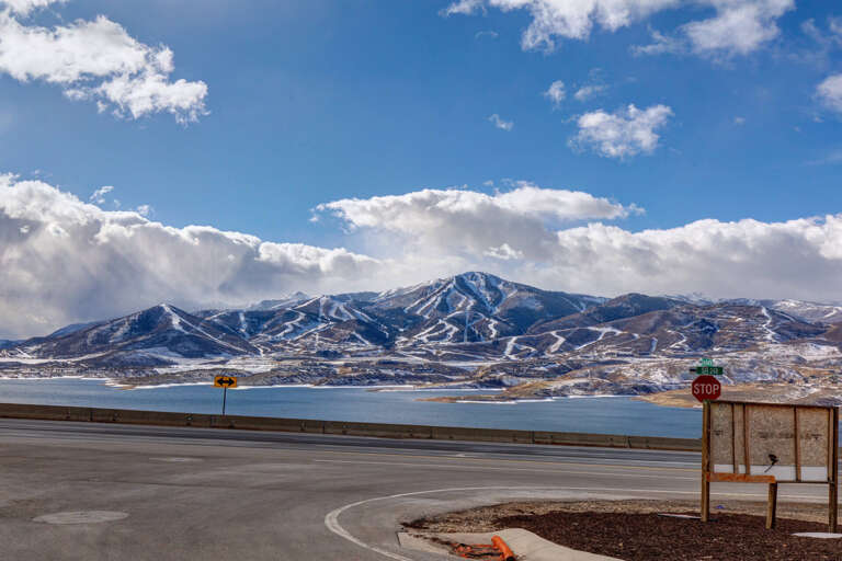 A scenic area featuring a striking ski mountain across the lake, offering dramatic winter terrain and year-round natural beauty near the property.