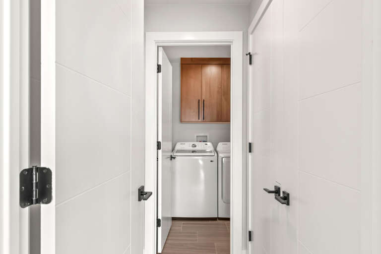 Klaim Retreats 822: In-Home Laundry Room Klaim Retreats 822: In-Home Laundry Room