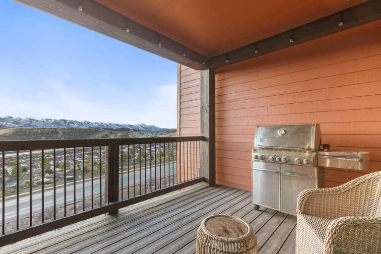 Your private balcony invites you to grill fresh meals while soaking in breathtaking mountain views and crisp alpine air.