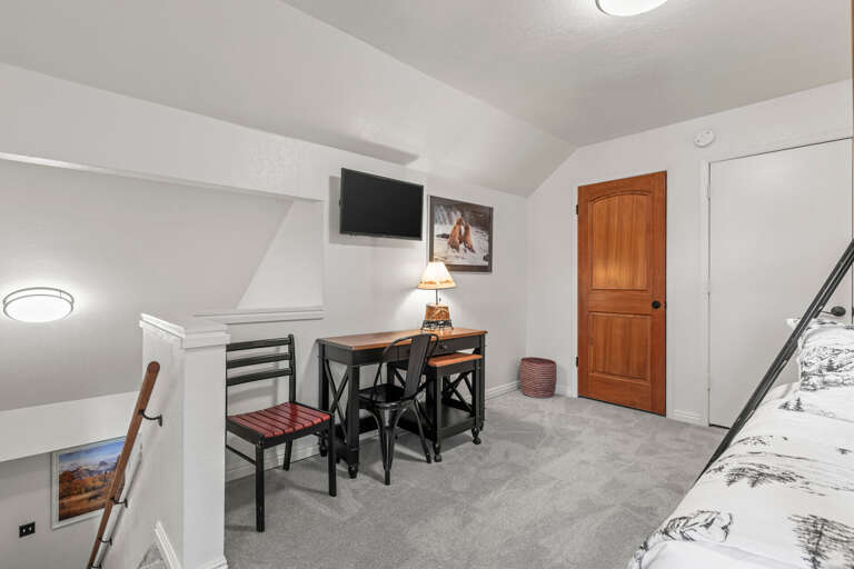 Cozy upstairs retreat with workspace, TV, and rustic charmâyour perfect mountain hideaway for work or relaxation.