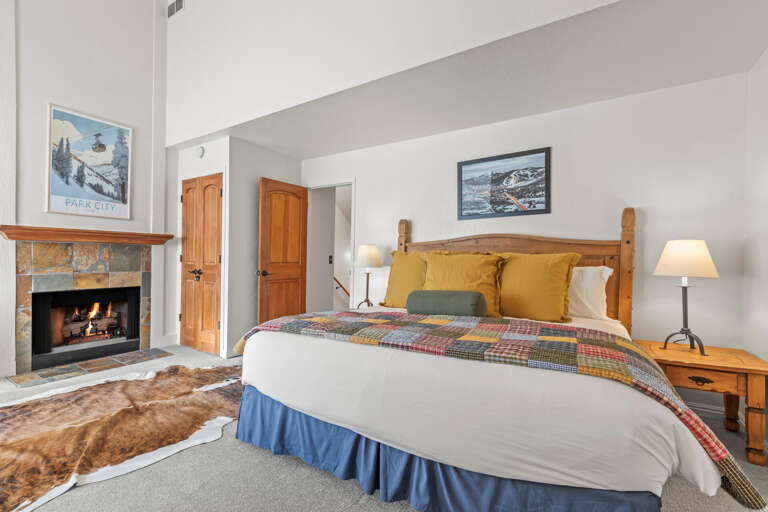 Warm up by your private fireplace after mountain adventures, then sink into comfortable bedding with cozy alpine touches.