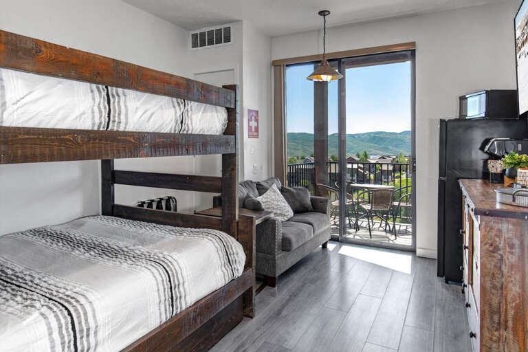 Cozy bunk beds and mountain views create the perfect retreat for you and your family to unwind after adventures.