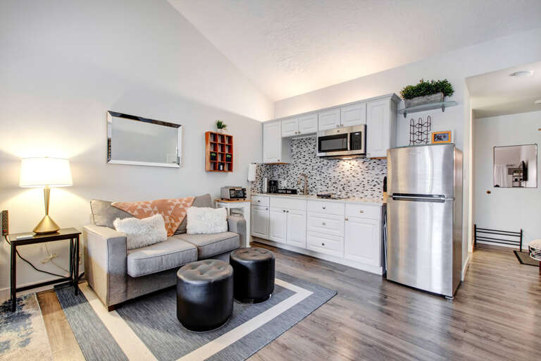 Step into your stylish open-plan retreat where modern comfort meets convenience. Cook, relax, and unwind in this thoughtfully designed space.