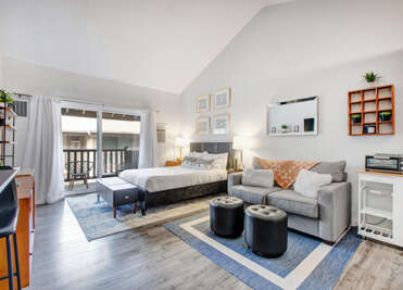 Your stylish studio combines comfort and function with a cozy queen bed, plush sofa, and modern kitchenetteâperfect for relaxing after exploring.