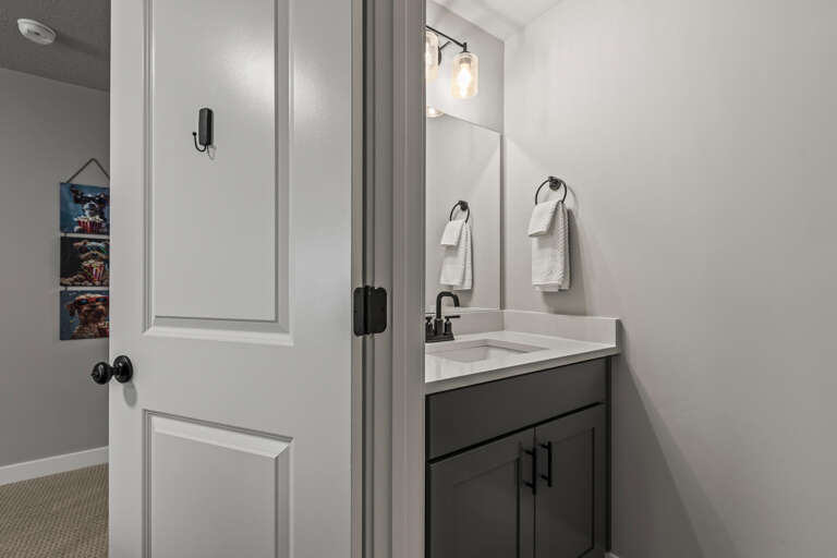 Refresh in your private bathroom with crisp white towels and modern fixtures that make your morning routine feel effortless.