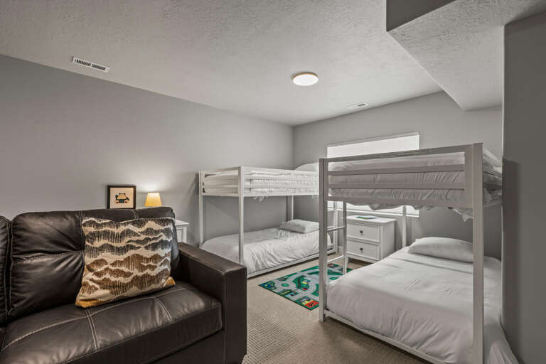 Your family will love this cozy bunk room where kids can create memories together in comfortable twin beds with soft linens.