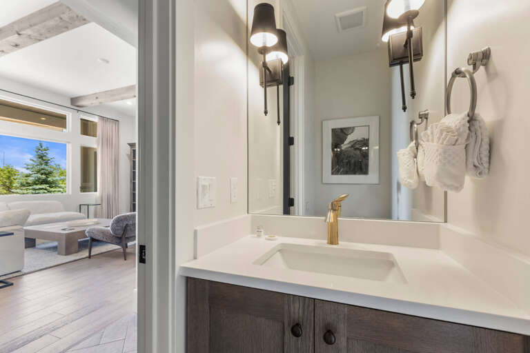 Jordanelle Estates 13200: Main level half bathroom off of the kitchen/living room