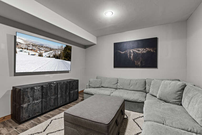 Sink into plush seating and unwind in your private media lounge, perfect for cozy movie nights or catching up on favorite shows.