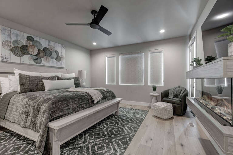 Sink into plush bedding and coastal-inspired textures in this beautifully designed bedroom. Soft lighting, modern dÃ©cor, and a peaceful color palette create the perfect retreat for restful nights.