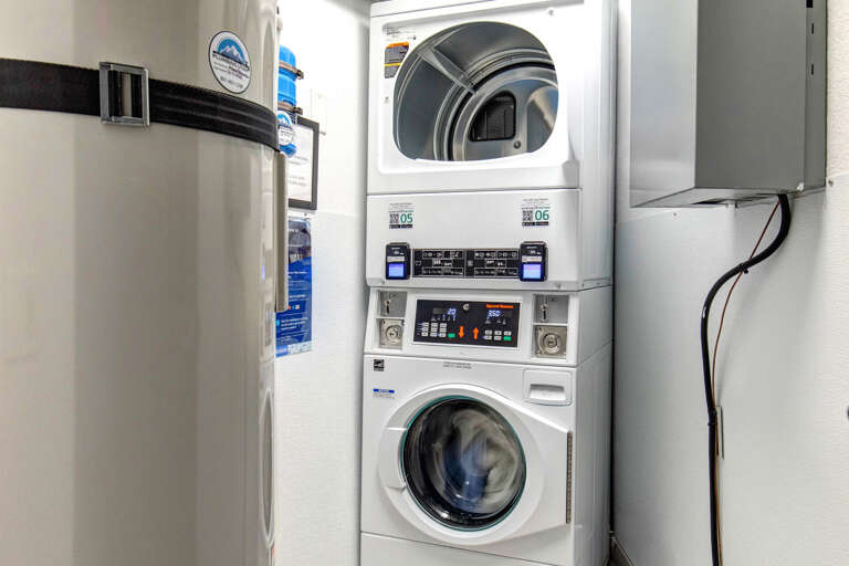 A convenient stacked washer and dryer setup ensures you can pack light and keep your clothes fresh throughout your stay.