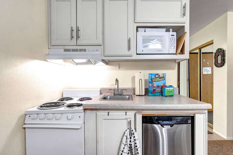 Your fully equipped kitchen has everything you need to prepare meals, from stove and microwave to dishwasher, making it easy to feel at home during your stay.